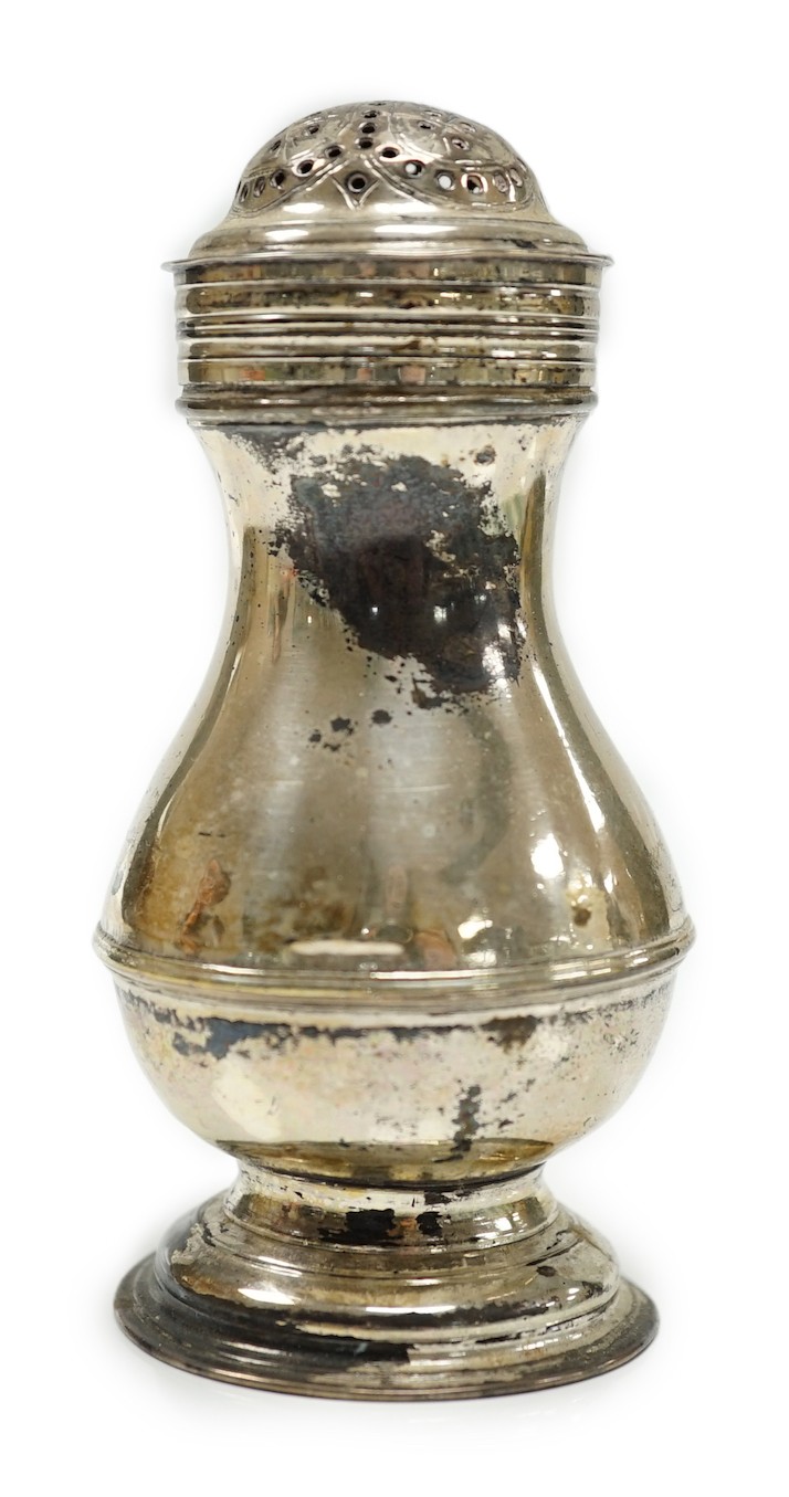 An early George II silver pepperette, maker's mark rubbed, London, 1729, 10cm.